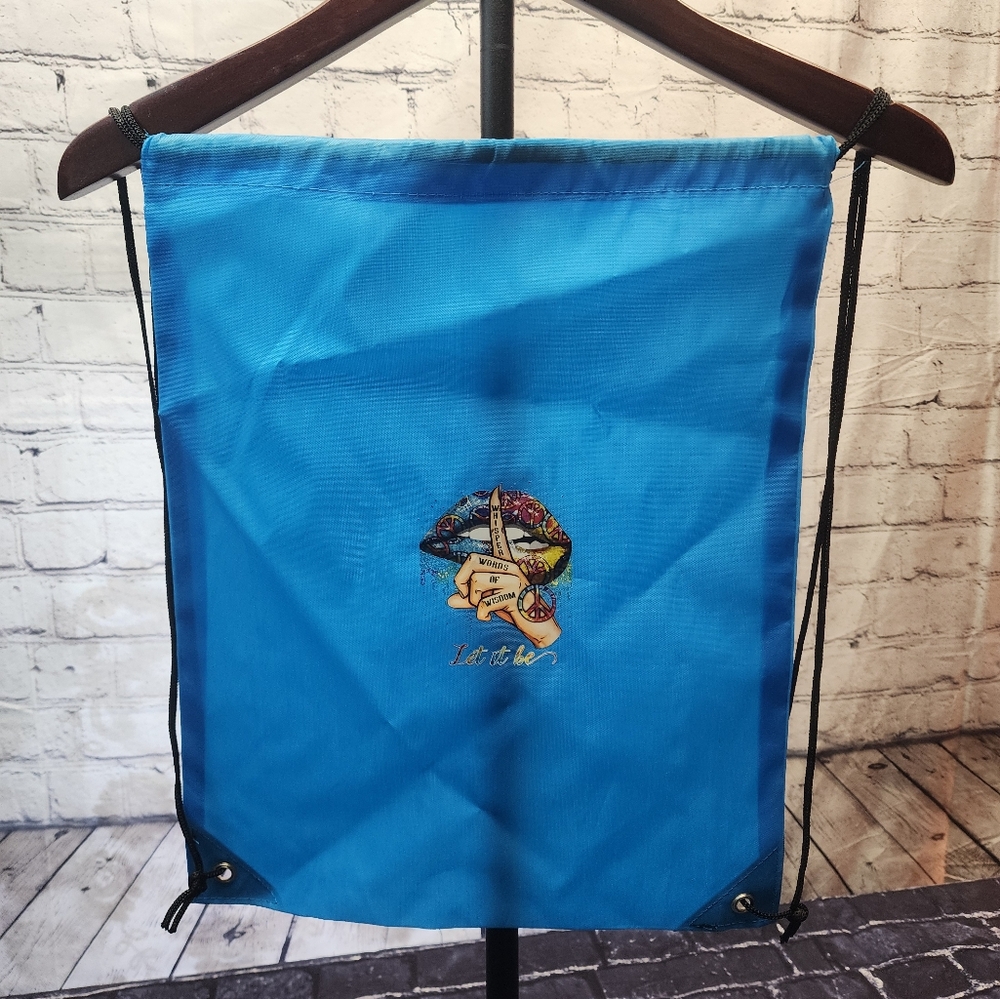 NEW Adult swag bag multicolor pattern on light blue material "words of wisdom"